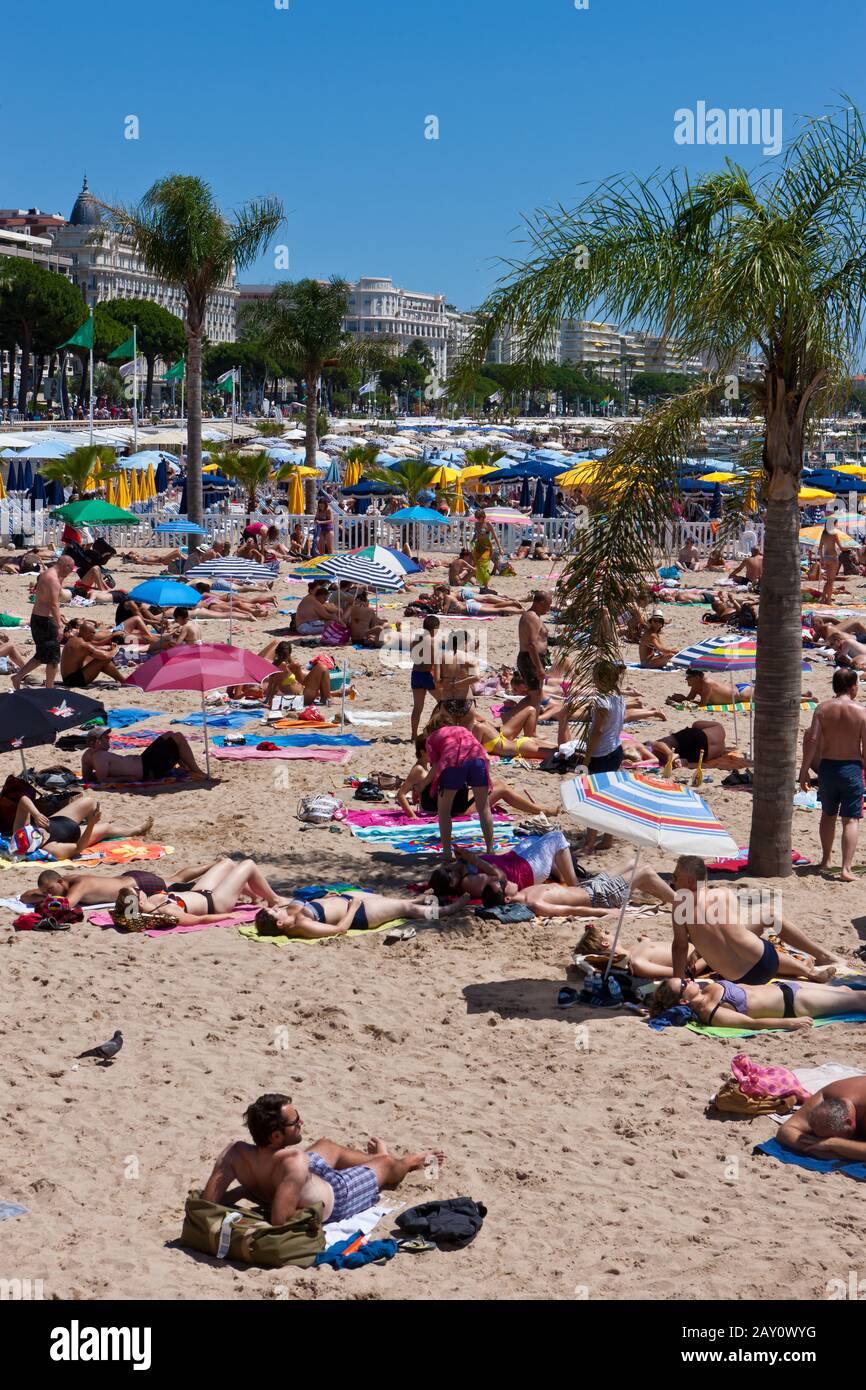 The beach of Cannes at the Croisette Stock Photo