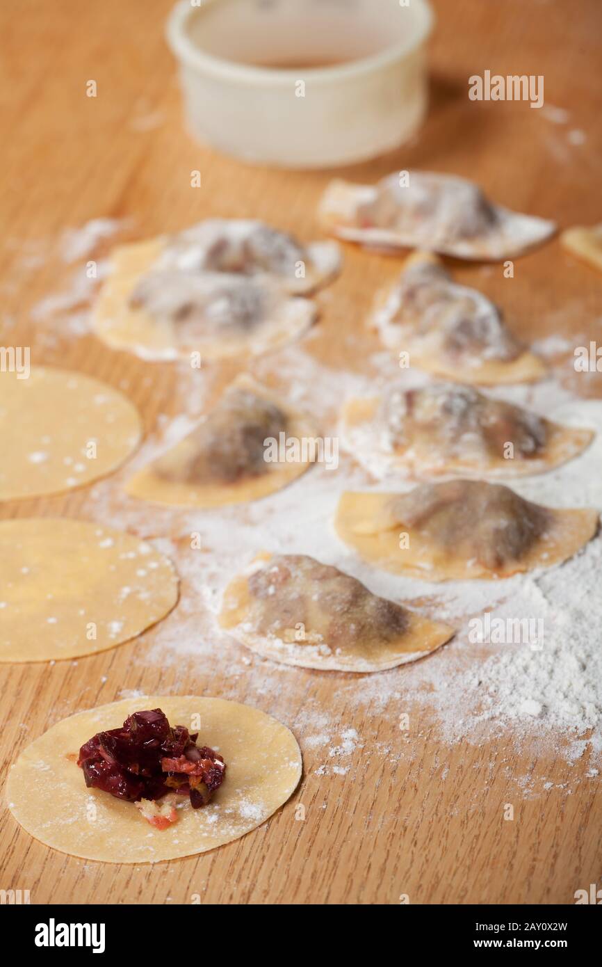 fresh ravioli with flour Stock Photo Alamy
