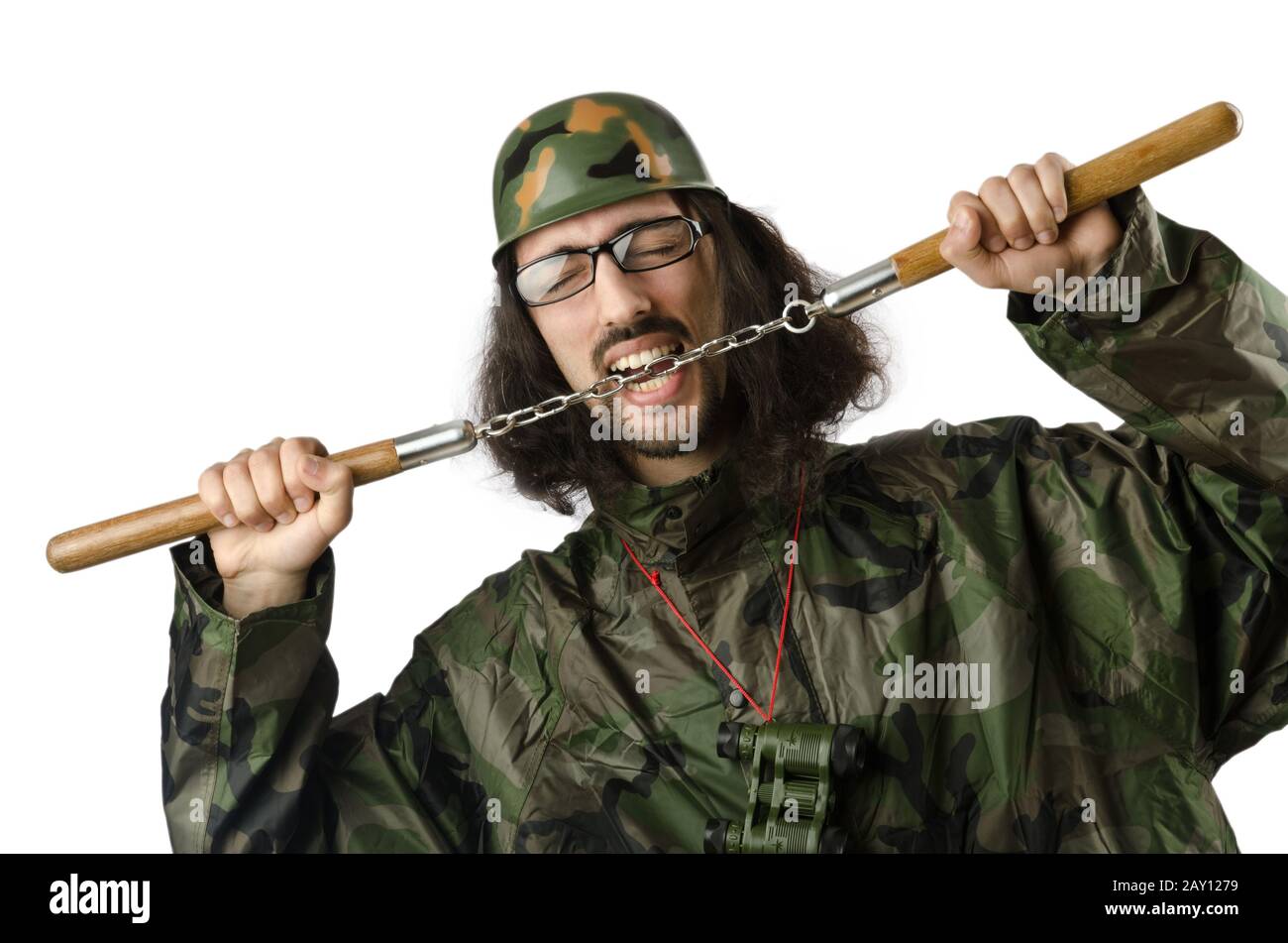 Funny soldier with nunchaku Stock Photo Alamy