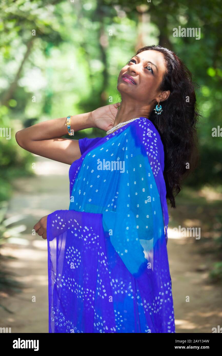 Young Indian woman in a Saree Stock Photo - Alamy
