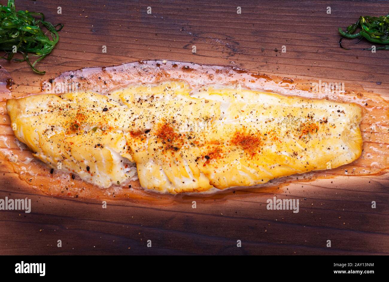 Sole on a grilling plank Stock Photo Alamy