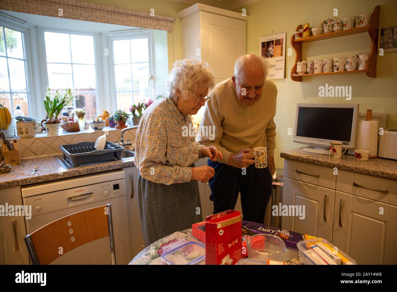 Married old age pensioners both in their 80's living together in their twilight years, England, United Kingdom Stock Photo