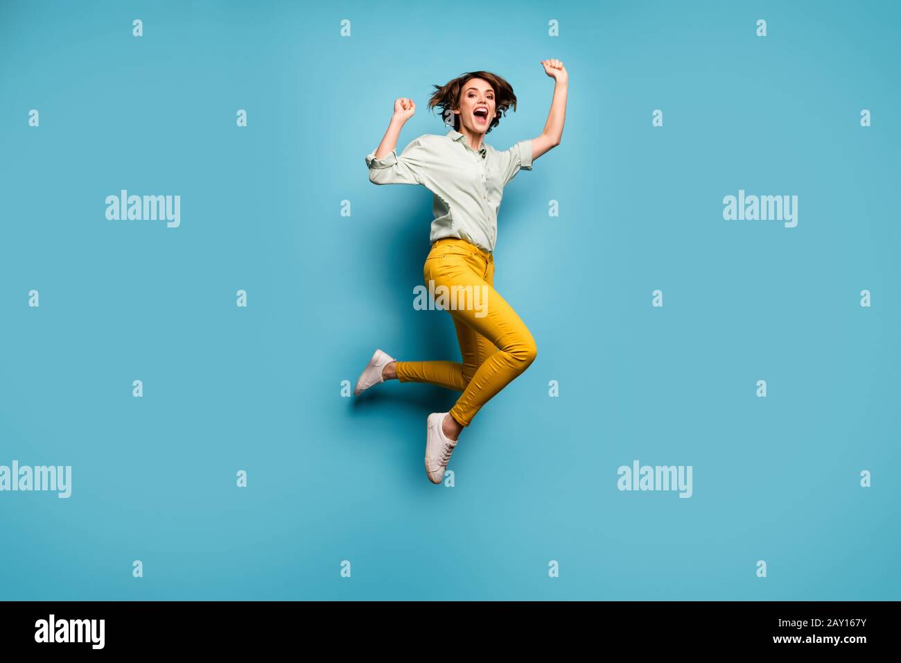 Full size photo of funky lady jumping high up celebrating weekend