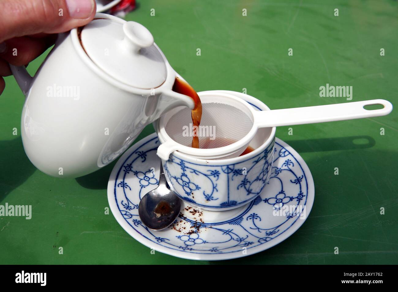 Coffee cup with coffee strainer Stock Photo Alamy