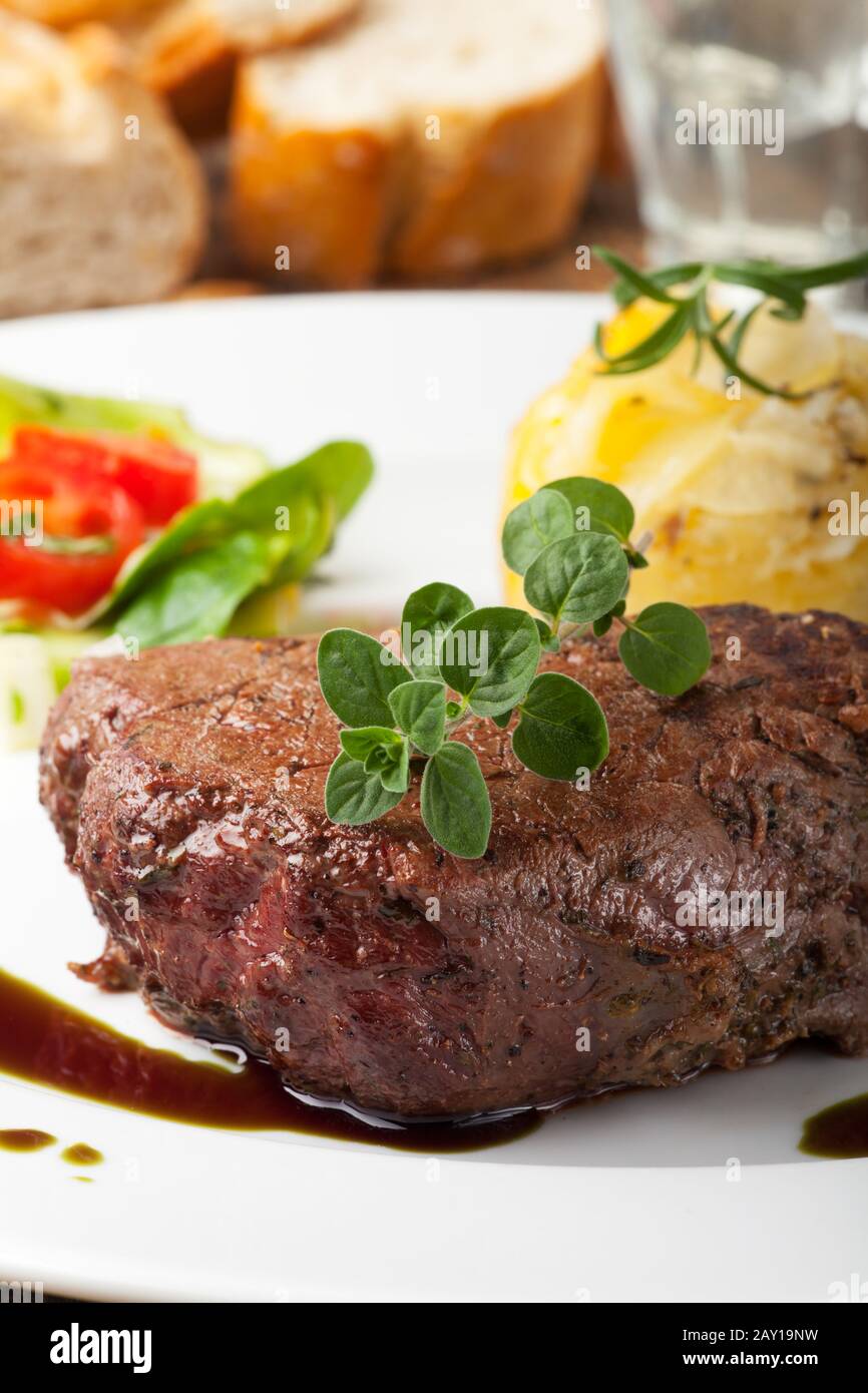Grilled Steak with Oregano Stock Photo Alamy