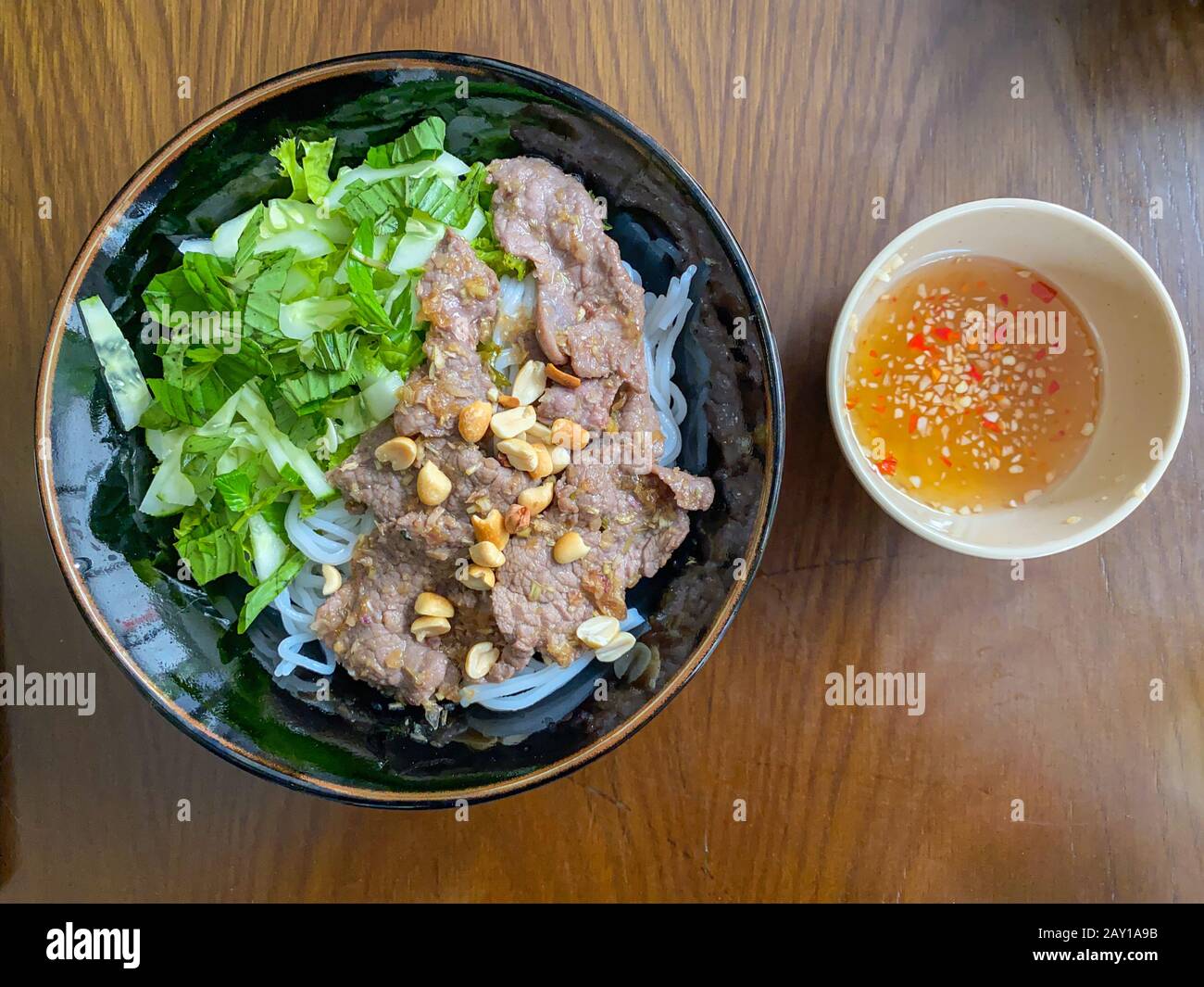 Top view photo of Vietnamese braised beef noodles bowl Stock Photo