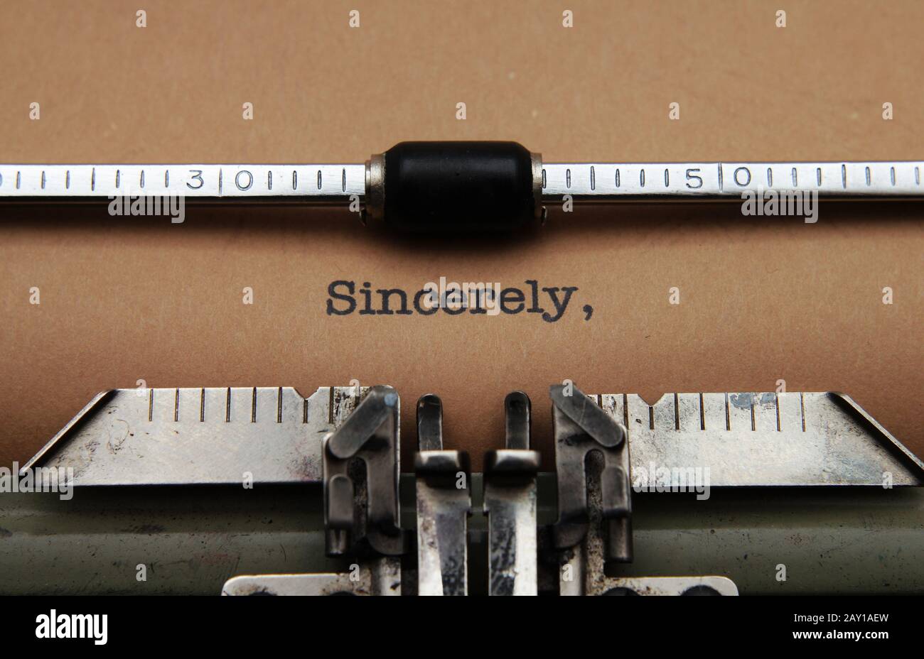 Sincerely text on typewriter Stock Photo - Alamy