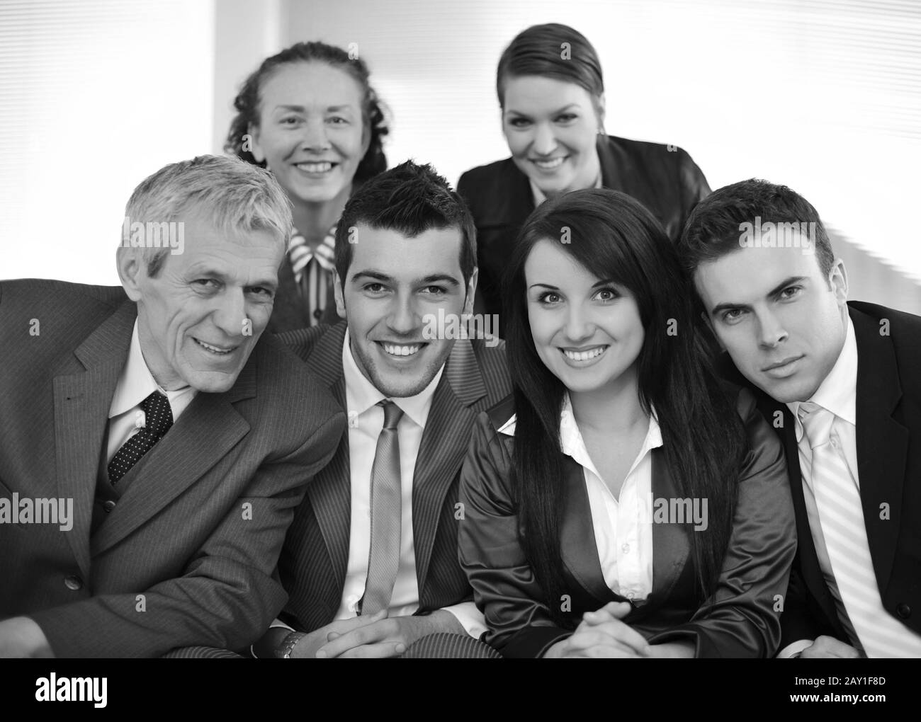Group mature people standing Black and White Stock Photos & Images - Alamy