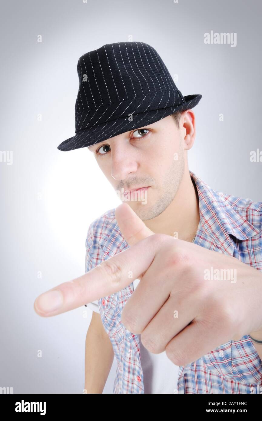 Trendy handsome young man with hat Stock Photo