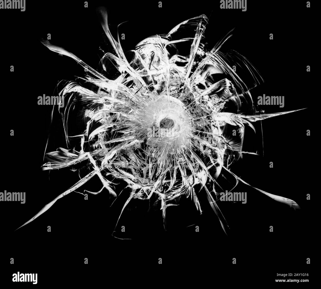 Cracked glass broken window on black background. Texture of broken