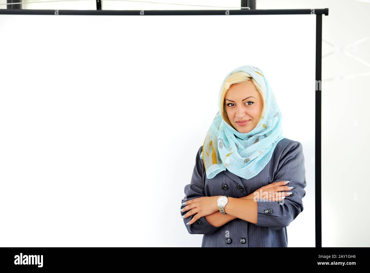 Arabic Muslim woman with copy space chart for presentation Stock Photo ...