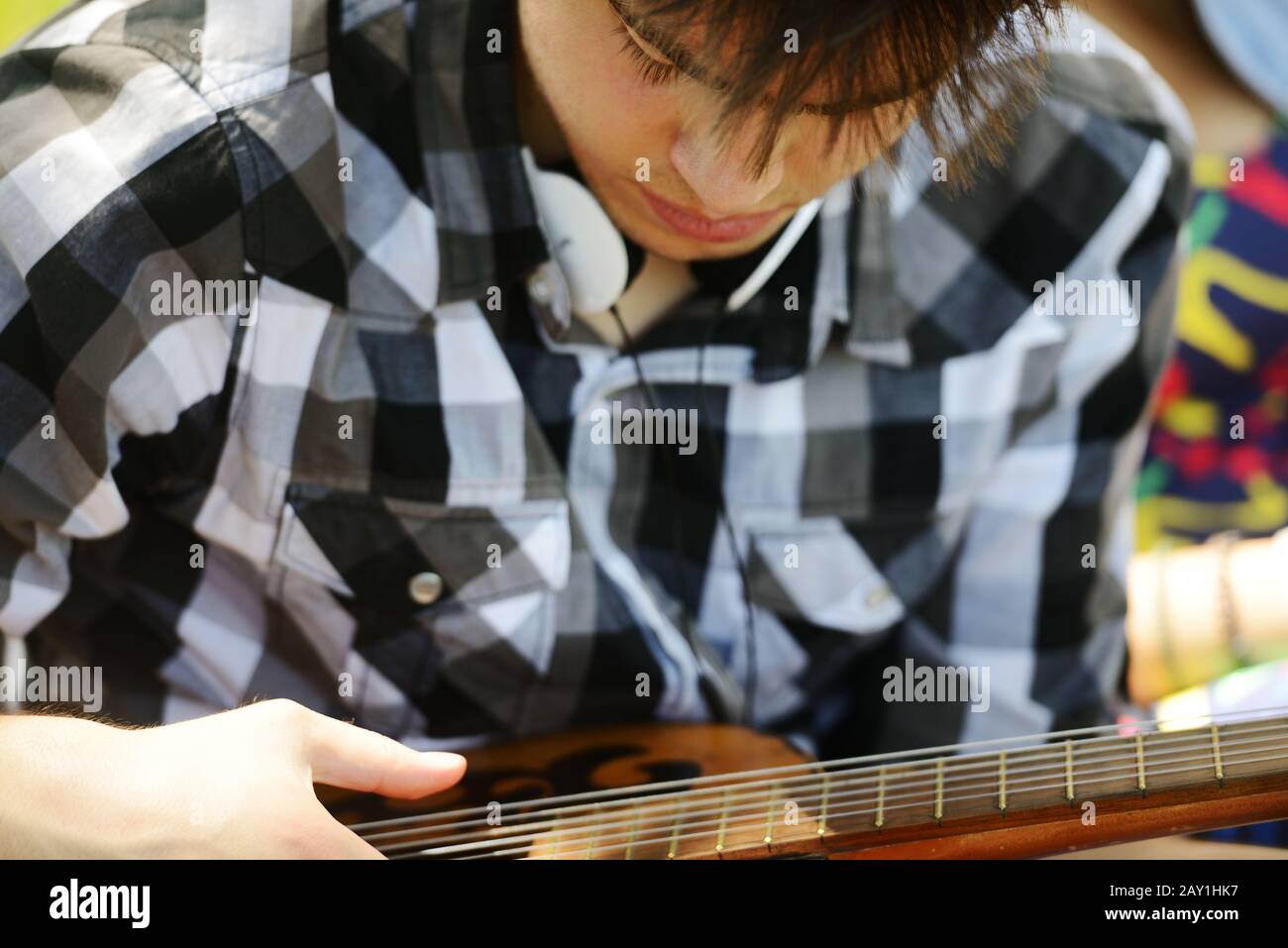 Man playing a guitar Stock Photo