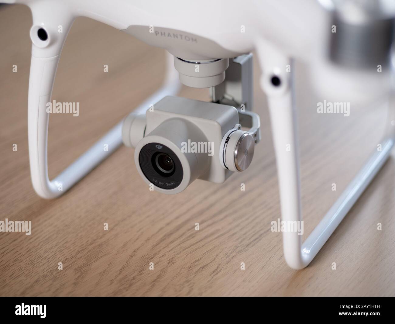 UK - Feb 2020: DJI Phantom 4 drone camera and landing gears on wooden  background Stock Photo - Alamy