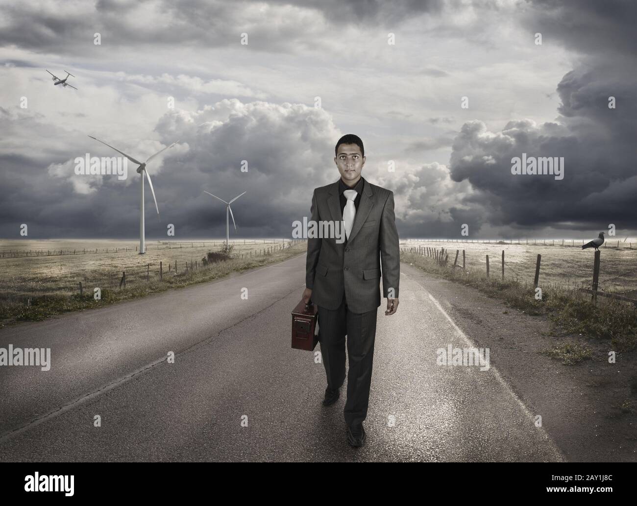 Young man walking empty road hi-res stock photography and images - Alamy