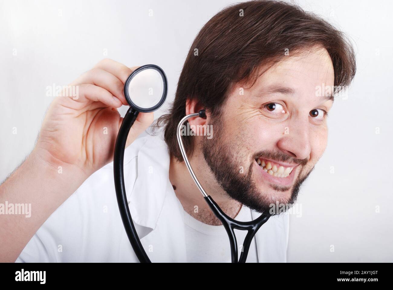 Young doctor using a stethoscope Stock Photo
