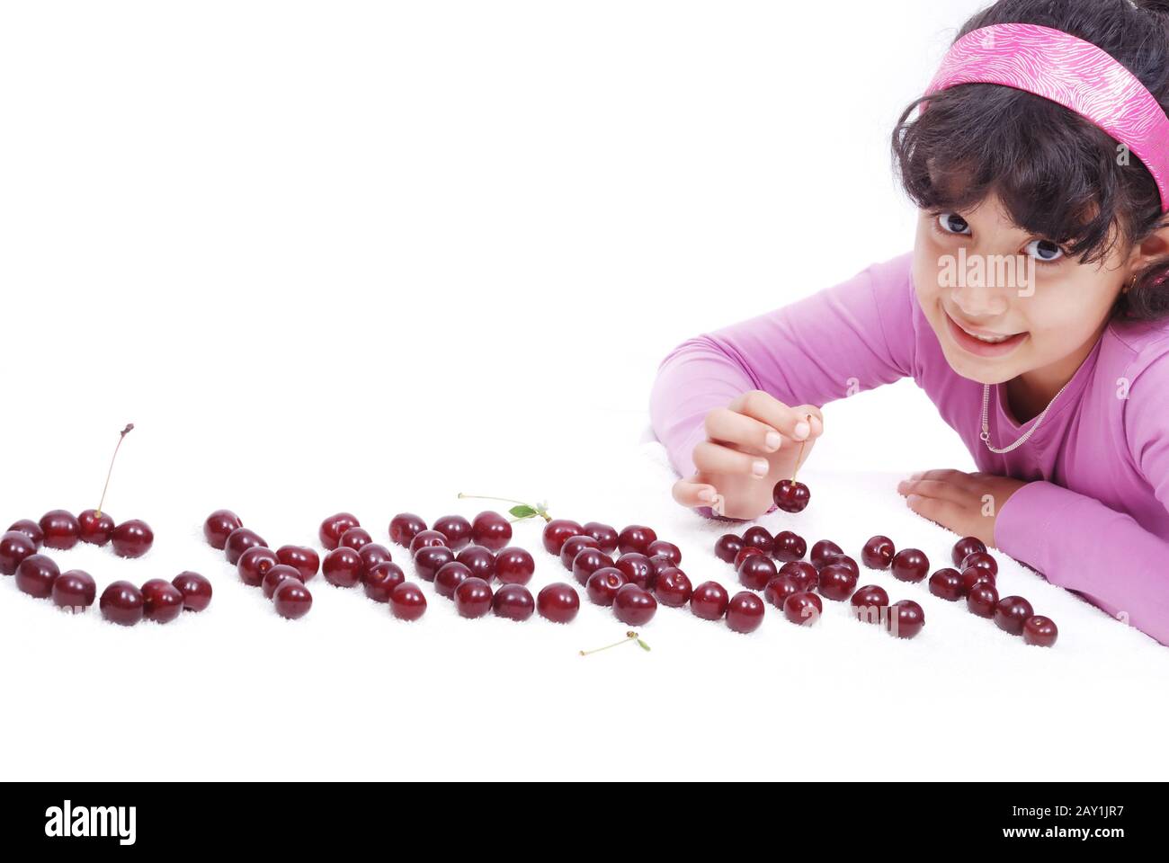 kid with cherry Stock Photo - Alamy