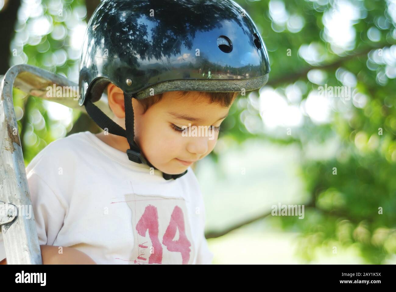 kid with helmet on