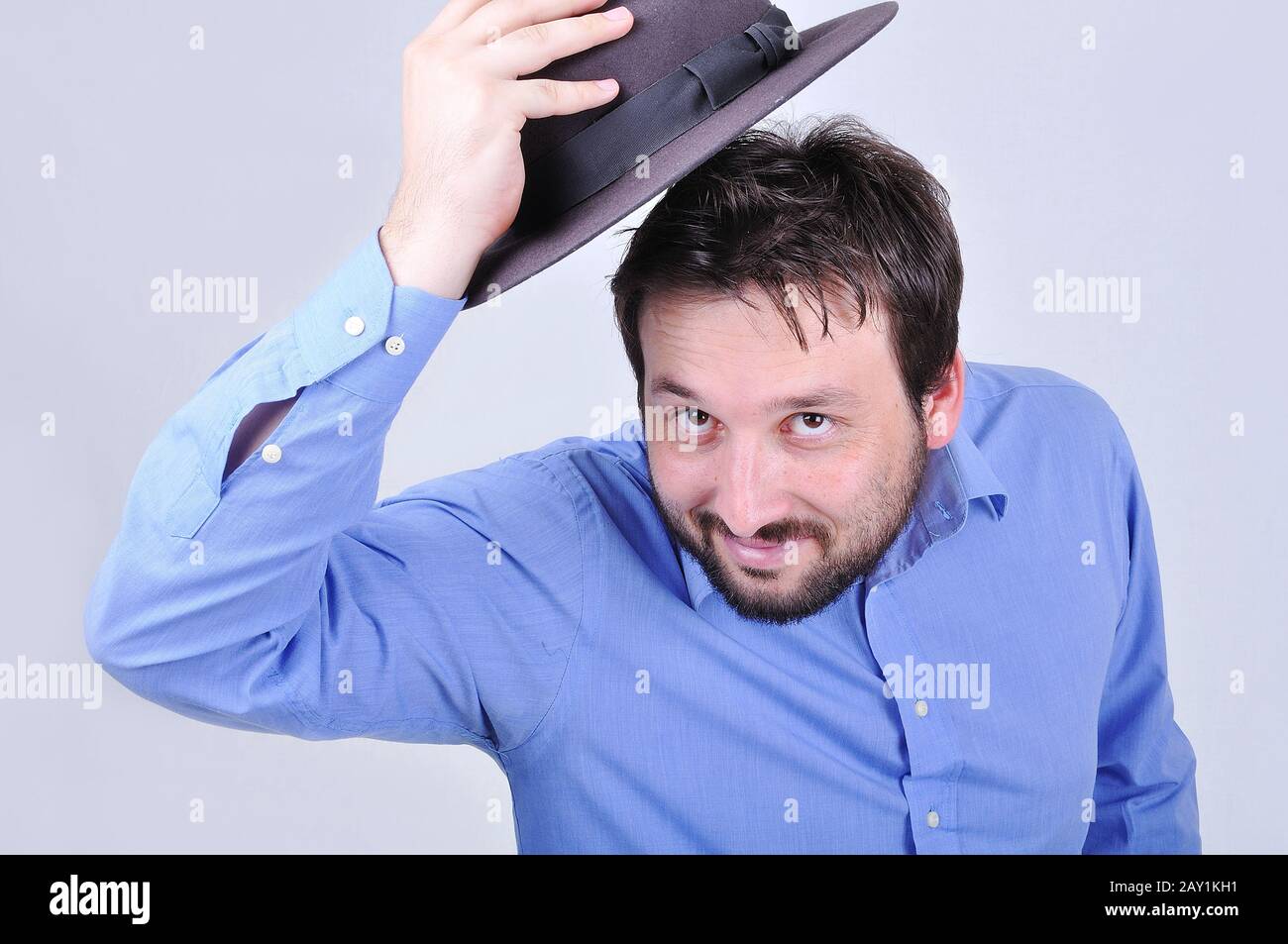 Man in a blue shirt hi-res stock photography and images - Alamy