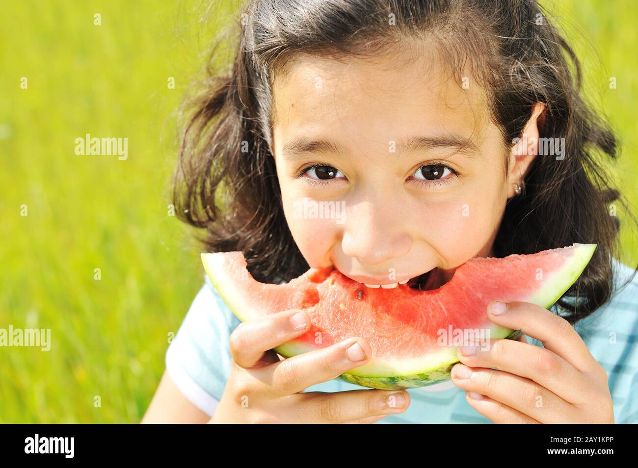Eating watermelon outside Stock Photo