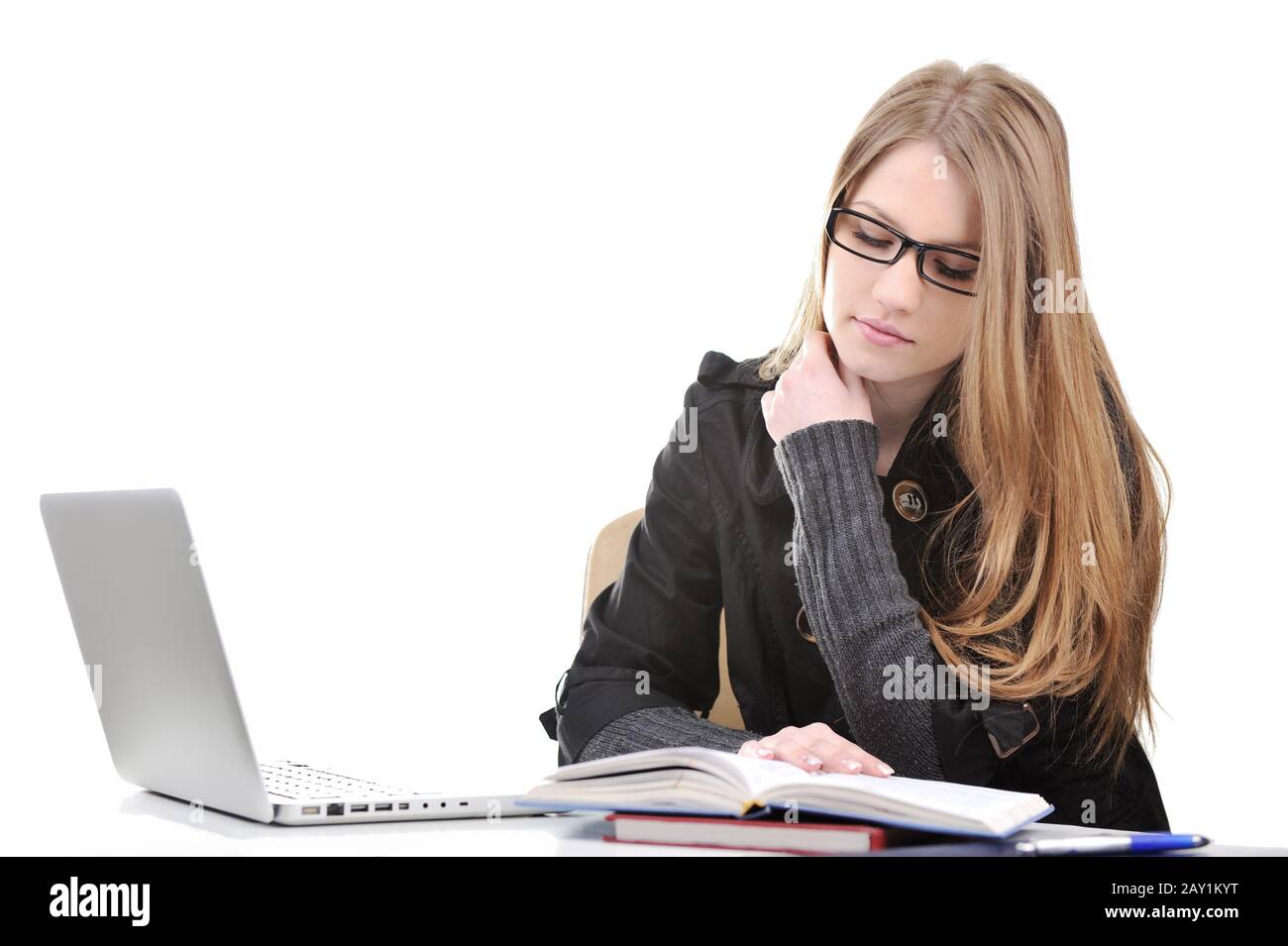 Beautiful college girl with laptop and books Stock Photo - Alamy