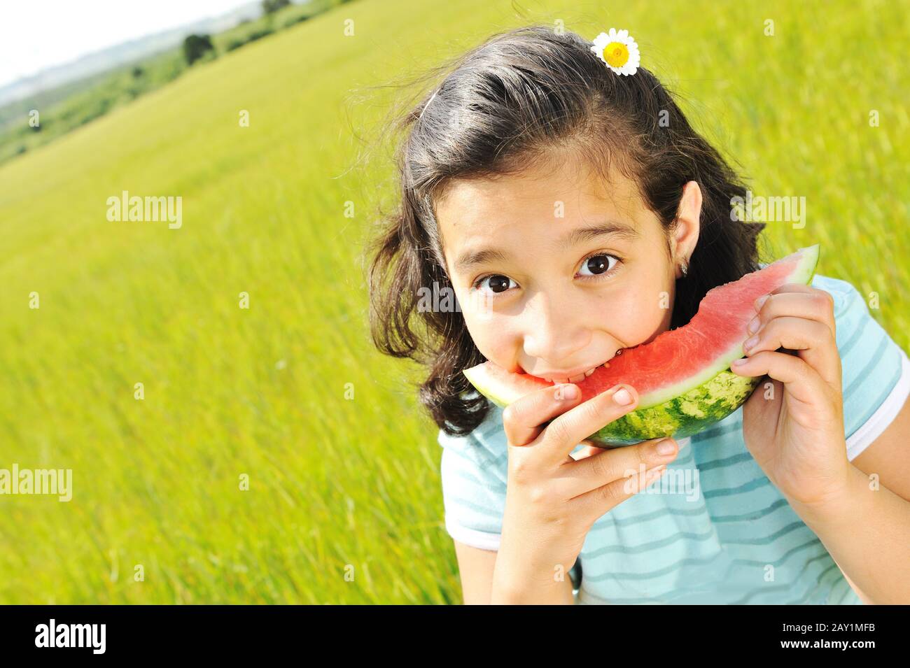 Eating watermelon outside Stock Photo