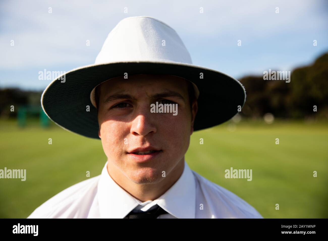 Cricket player looking at the camera Stock Photo