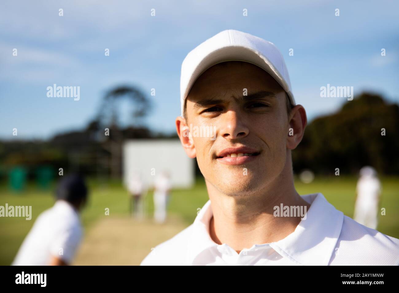 Cricket player looking at the camera Stock Photo