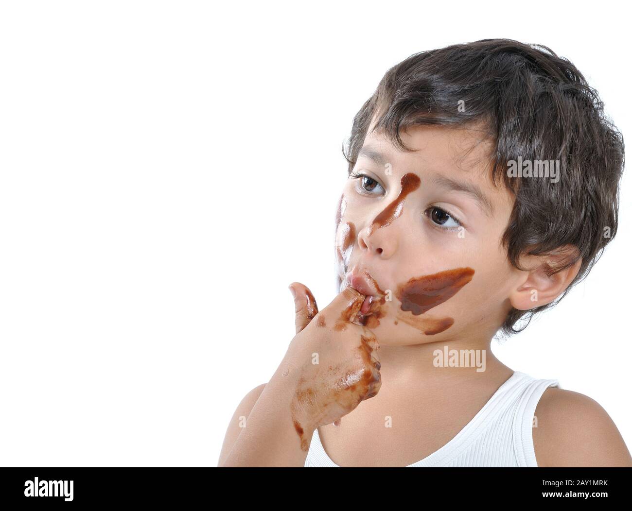 Cute kid with chocolate on his face Stock Photo Alamy