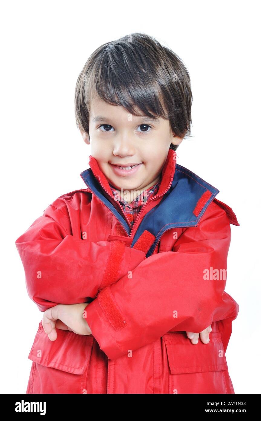 Kid with red jacket on white background Stock Photo Alamy