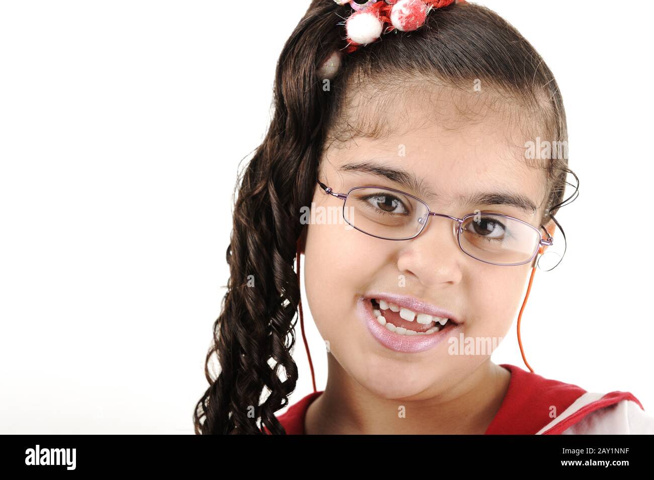 Mixed race adorable cute little school girl portrait, arabic african american Stock Photo