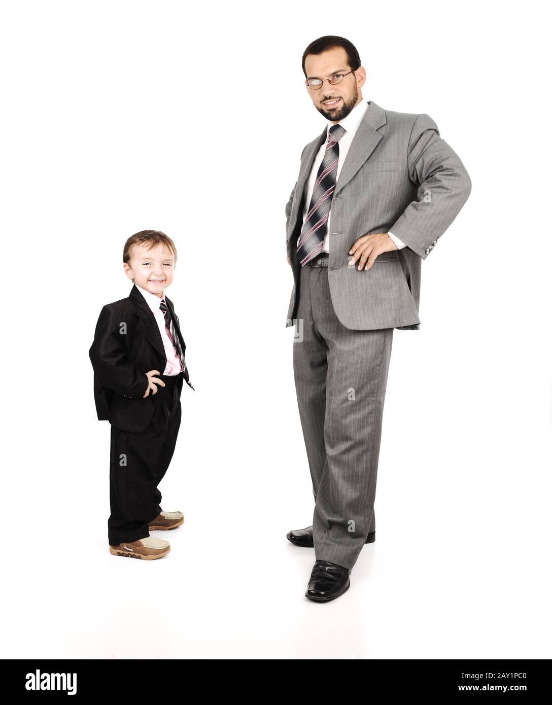 Young father and his son wearing suits Stock Photo Alamy