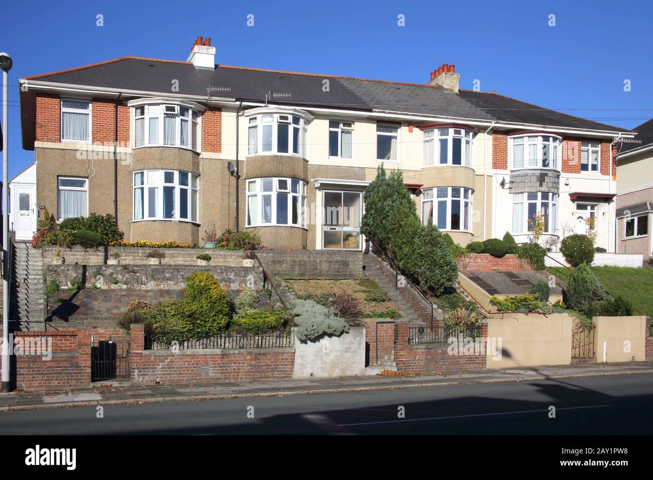 a row of terraced houses at marsh mills plymouth devon Stock Photo Alamy