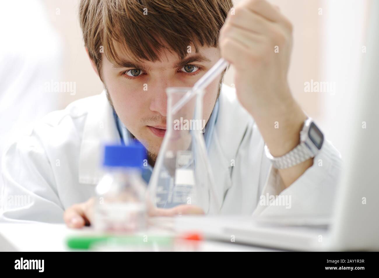 Young medical scientist working in modern lab Stock Photo