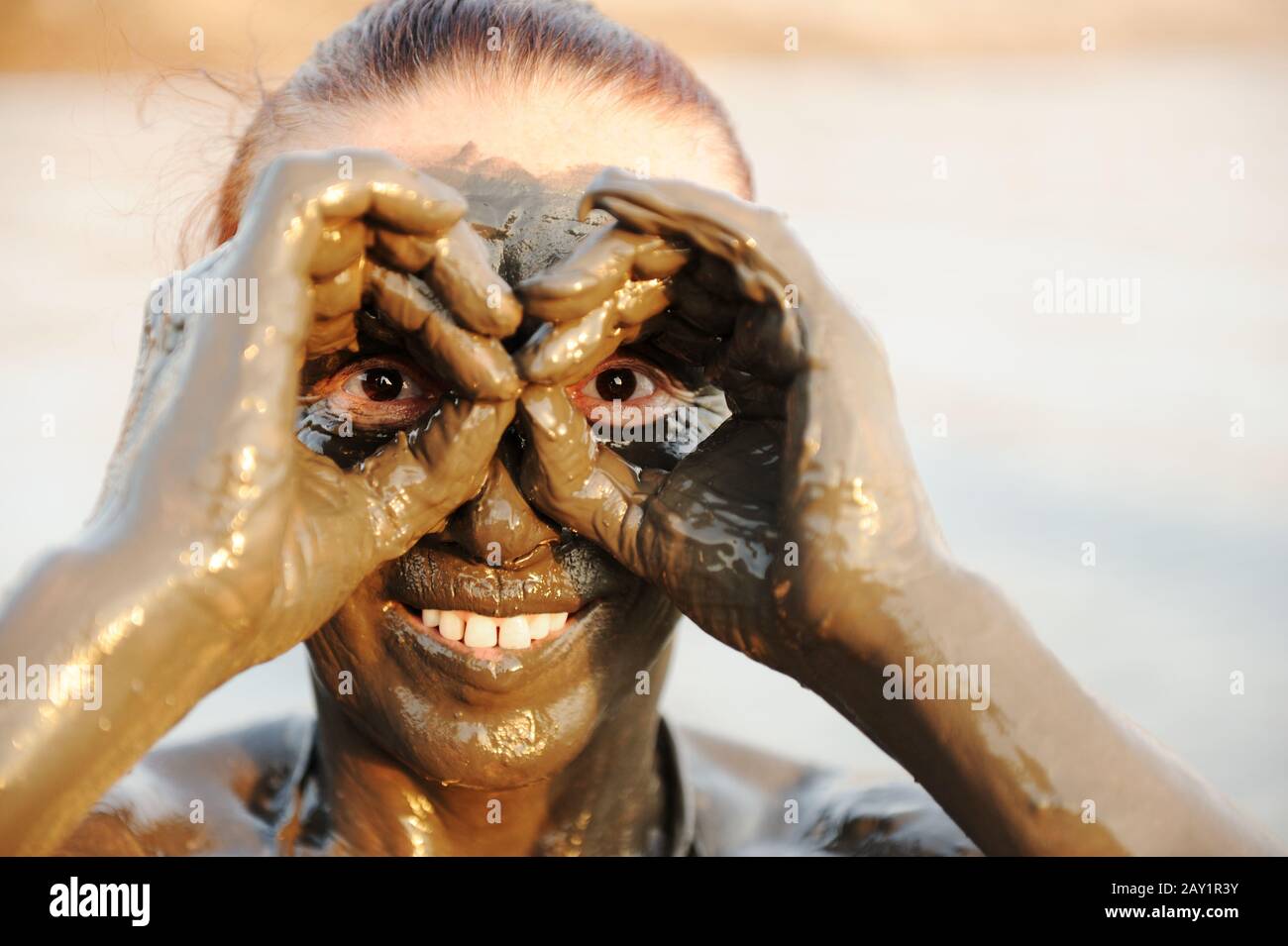 Woman brown mask mud hi-res stock photography and images - Alamy