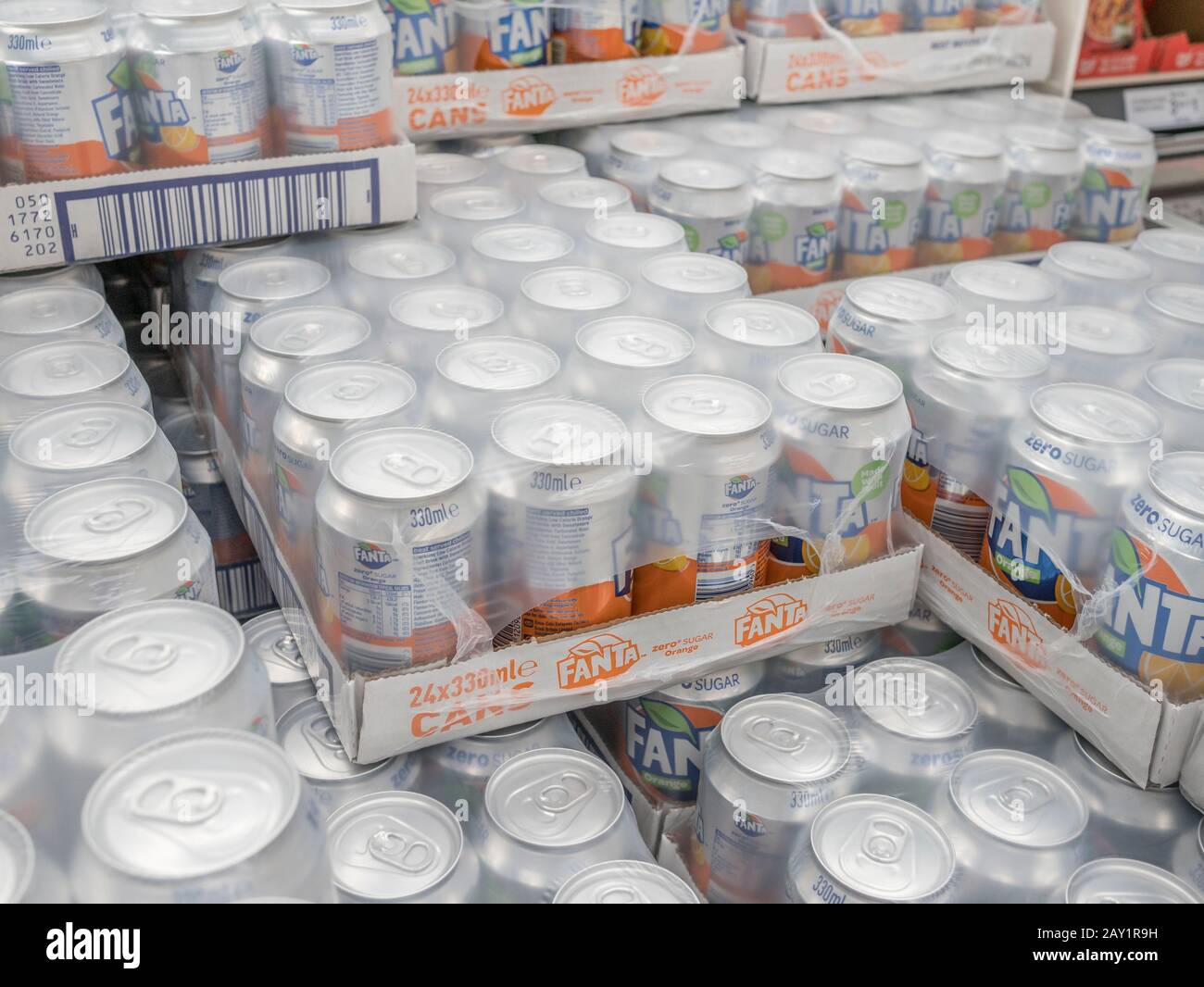 Stack 24pack cartons of Fanta Zero sugar soft drink on display in UK