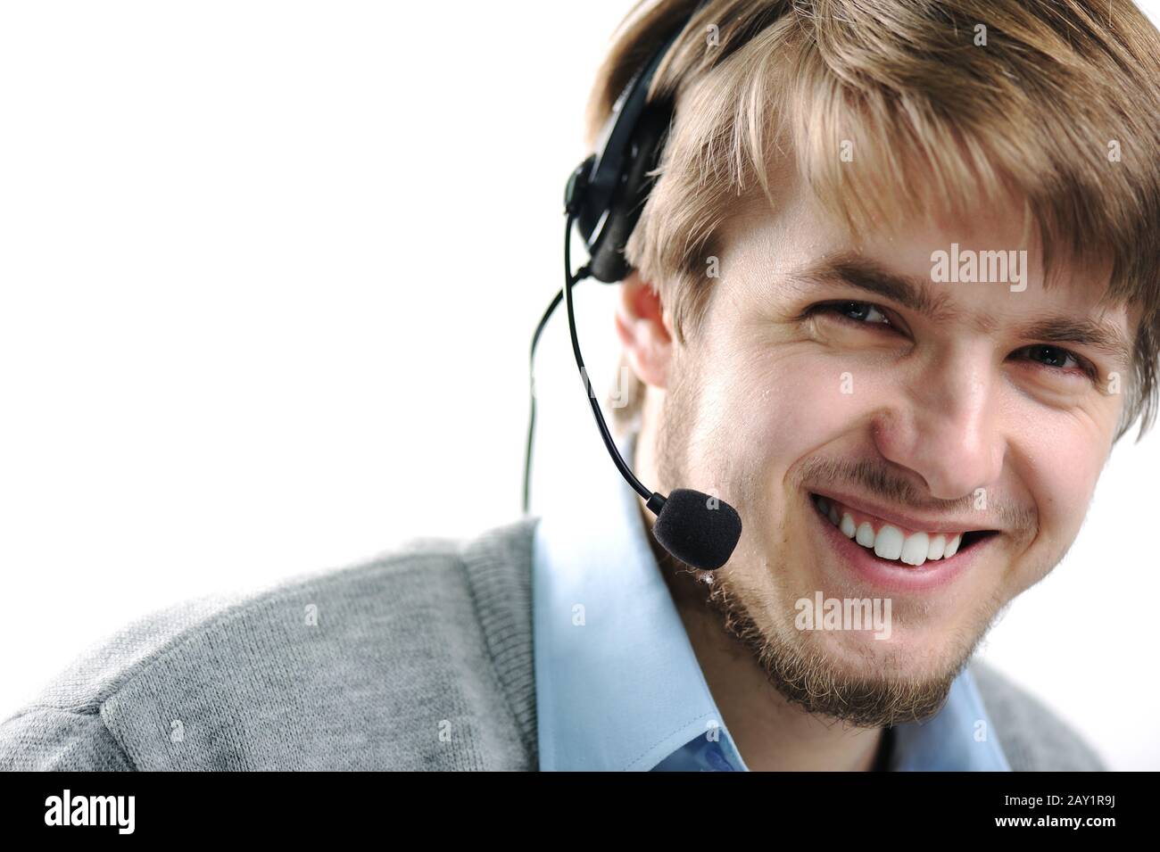 Attractive blond support person Stock Photo