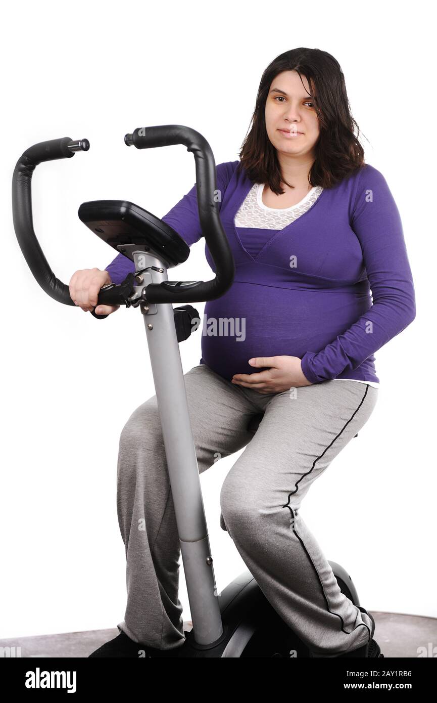 Pregnant woman on treadmill Stock Photo Alamy