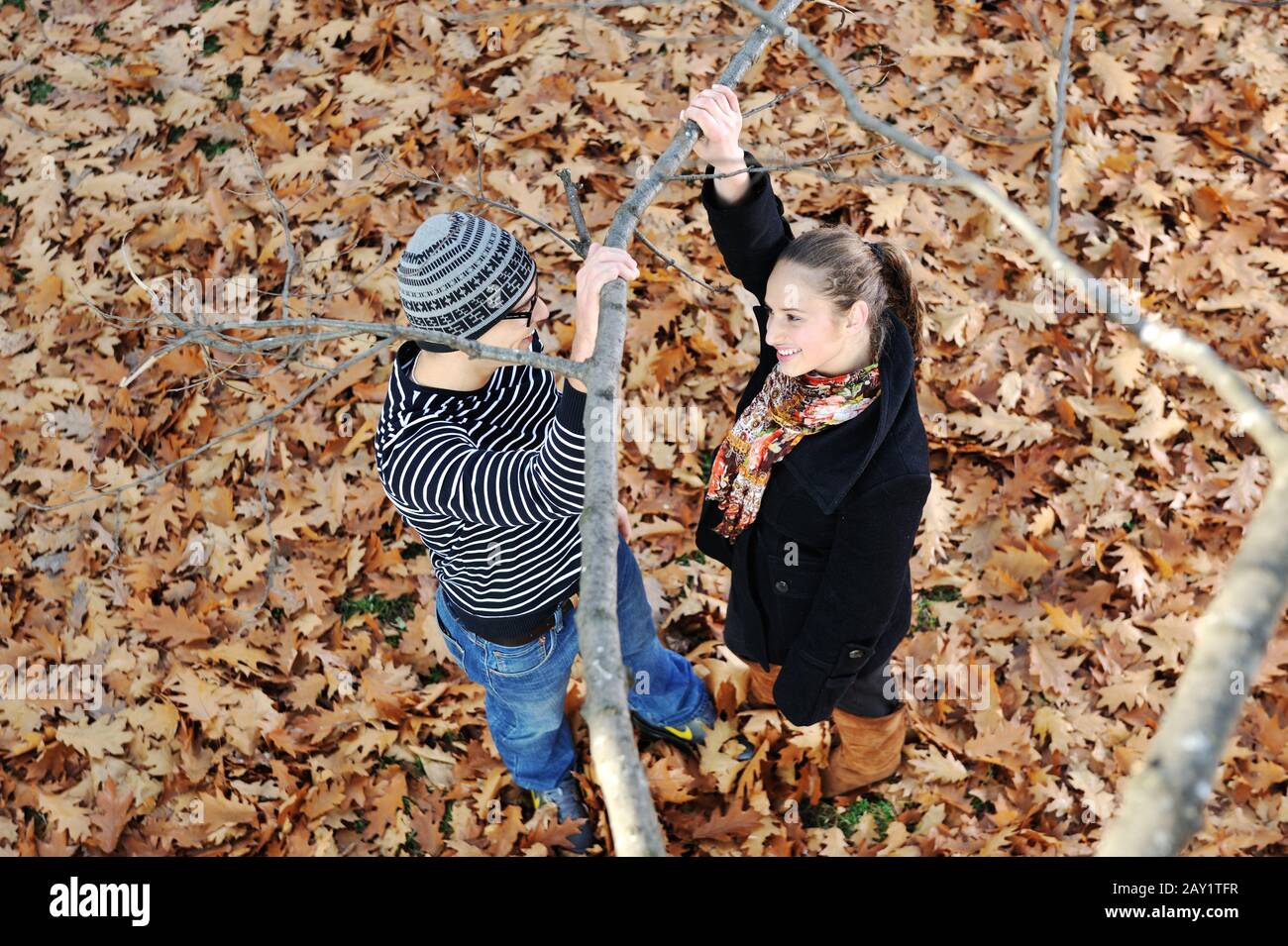 Romantic Teenage Couple Tree In High Resolution Stock Photography and ...