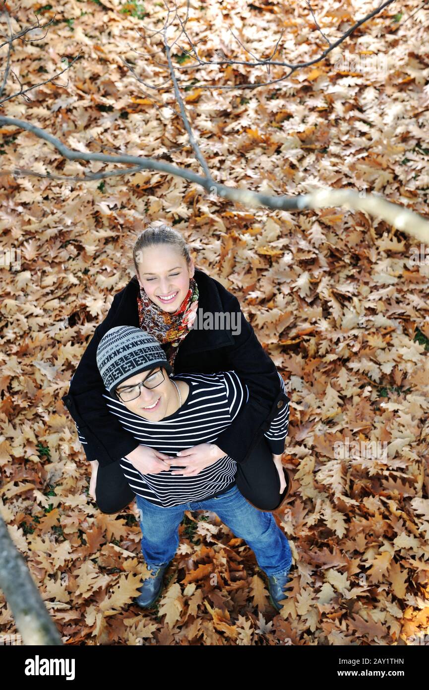 Romantic teenage couple tree in hi-res stock photography and images - Alamy