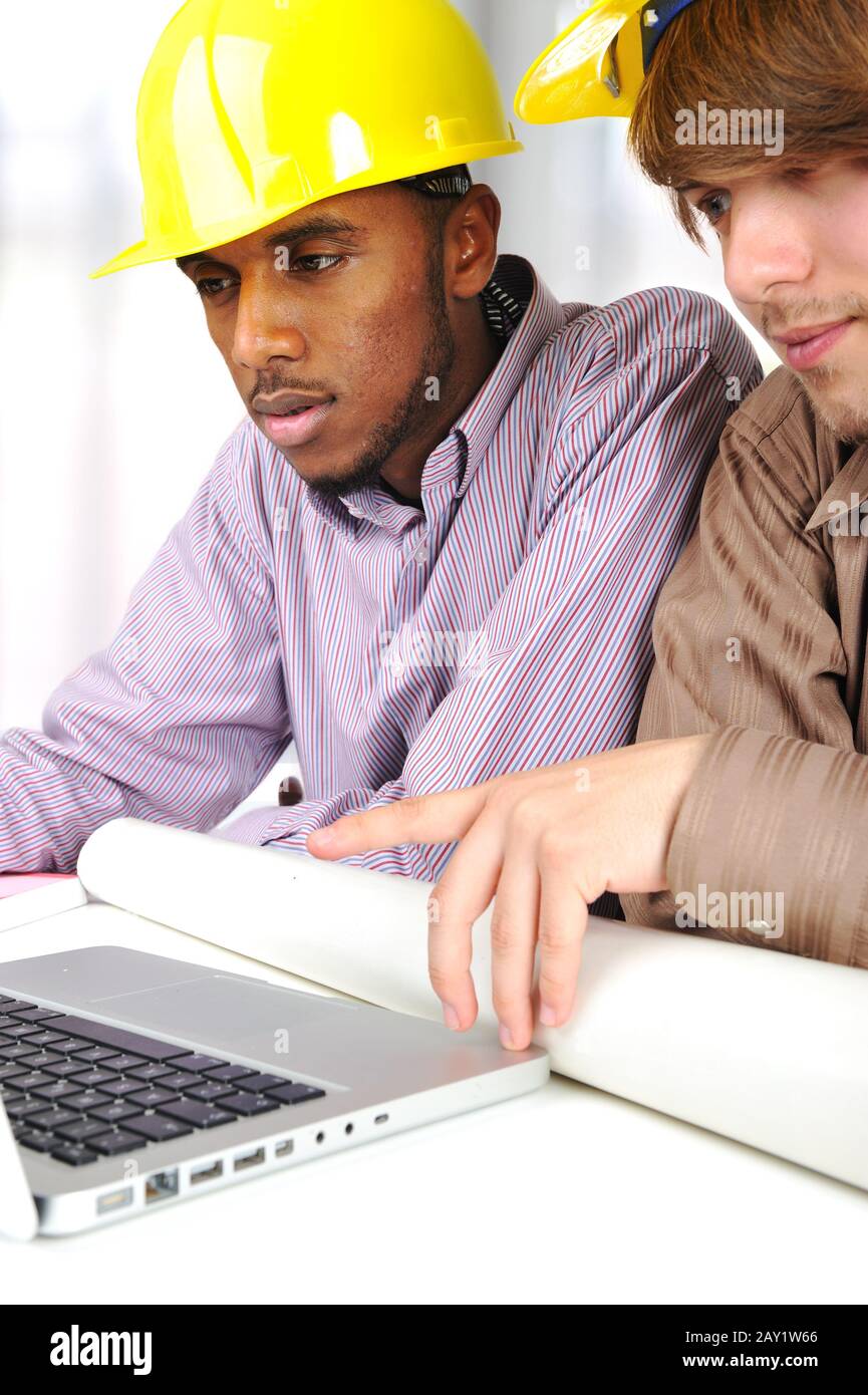 Portrait two young engineers laptop hi-res stock photography and images ...