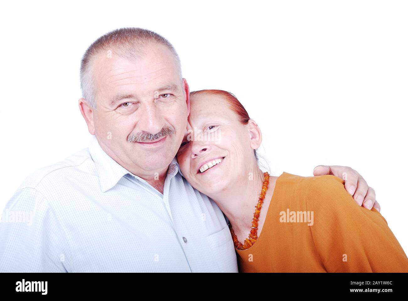 Happy middle aged couple smiling isolated Stock Photo
