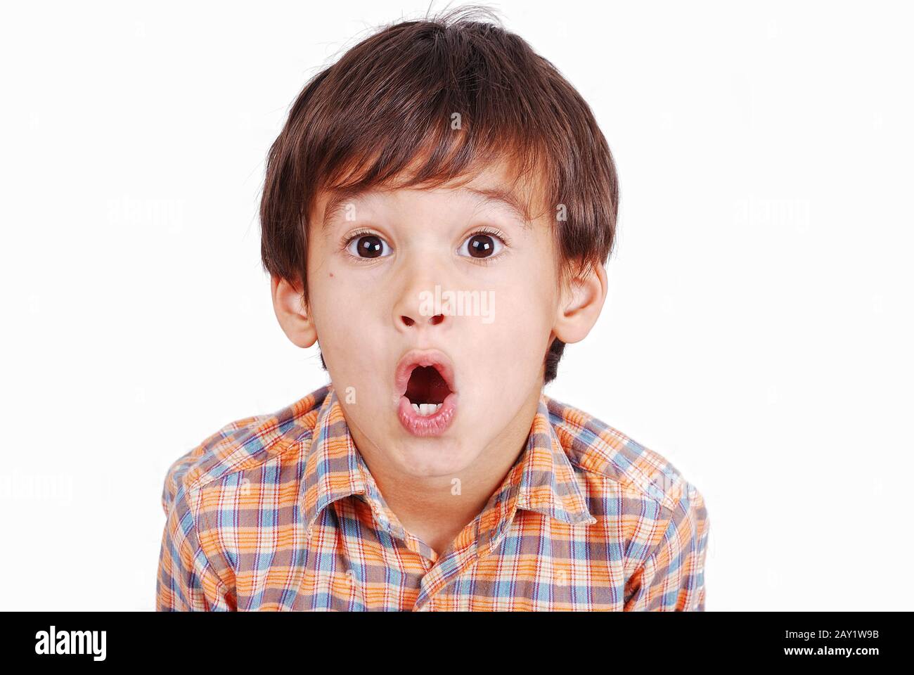 Cute funny boy with surprised face isolated Stock Photo - Alamy