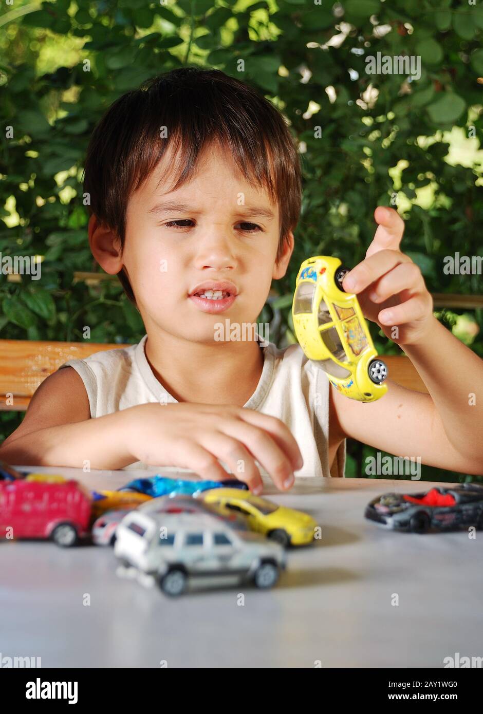 Children playing with cars toys outdoor in summer time Stock Photo Alamy
