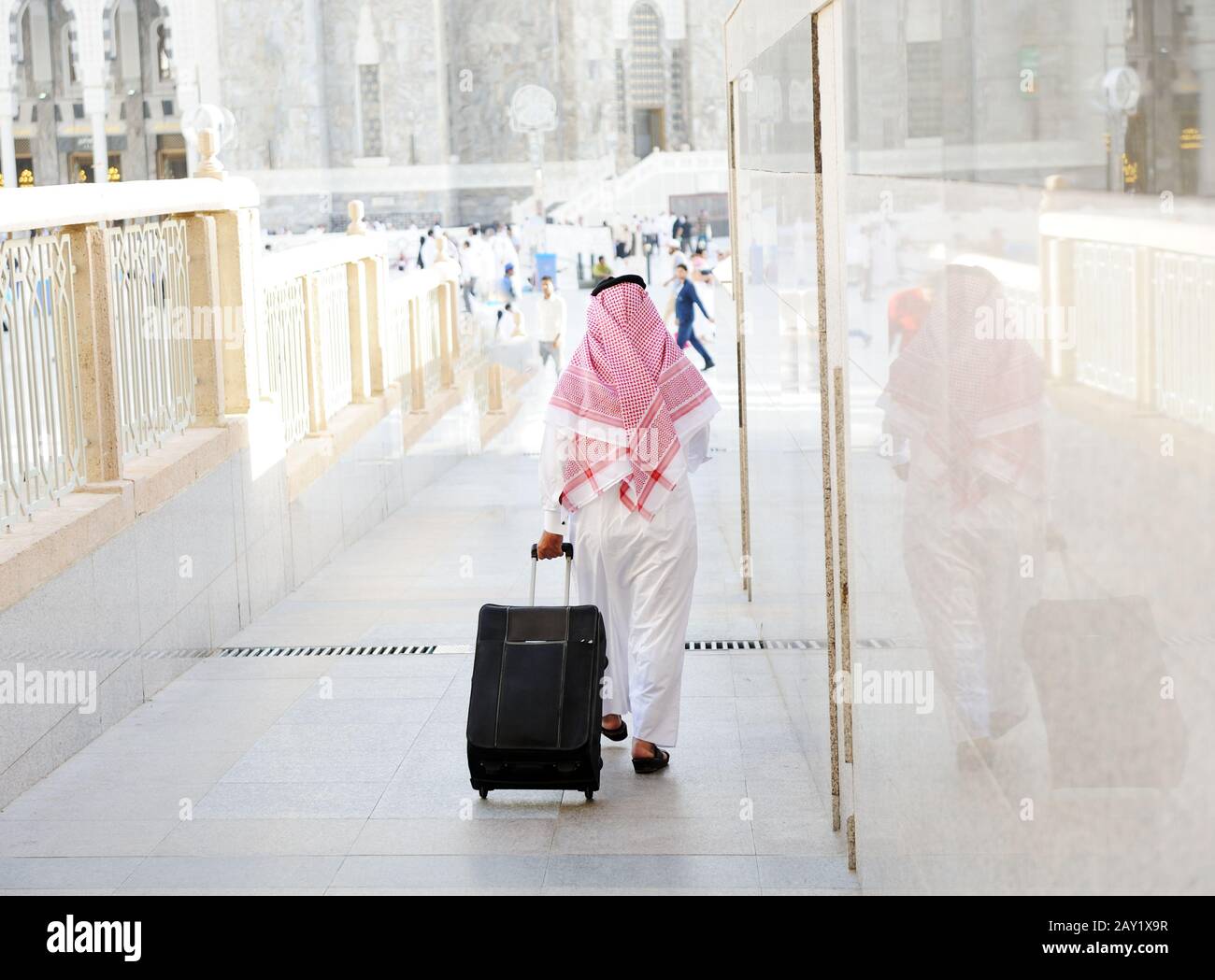 Arabic businessman walking Stock Photo