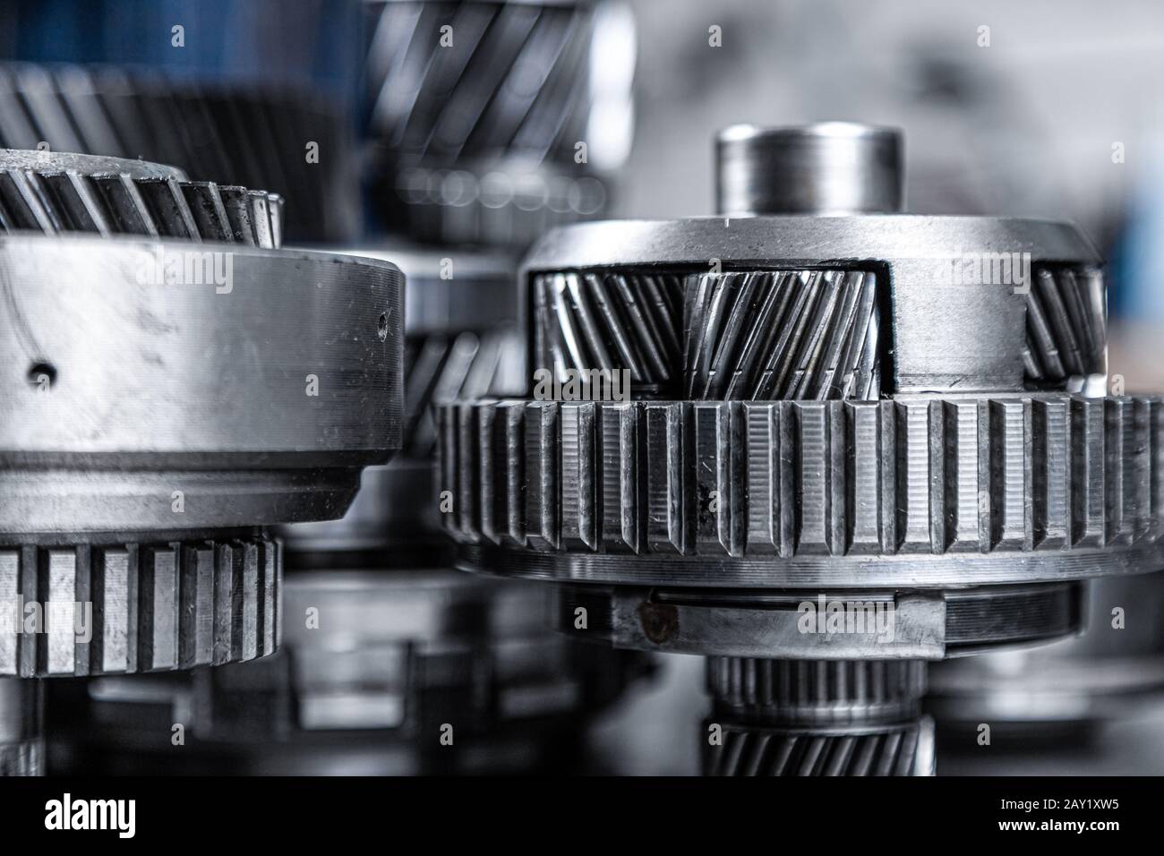 Set of various engine and gearbox spare parts. Shiny gears for