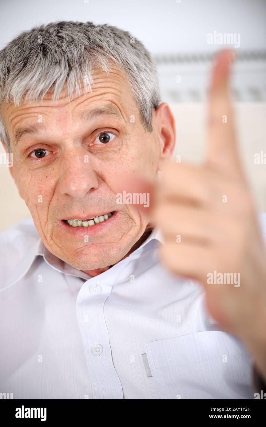 Angry senior man Stock Photo