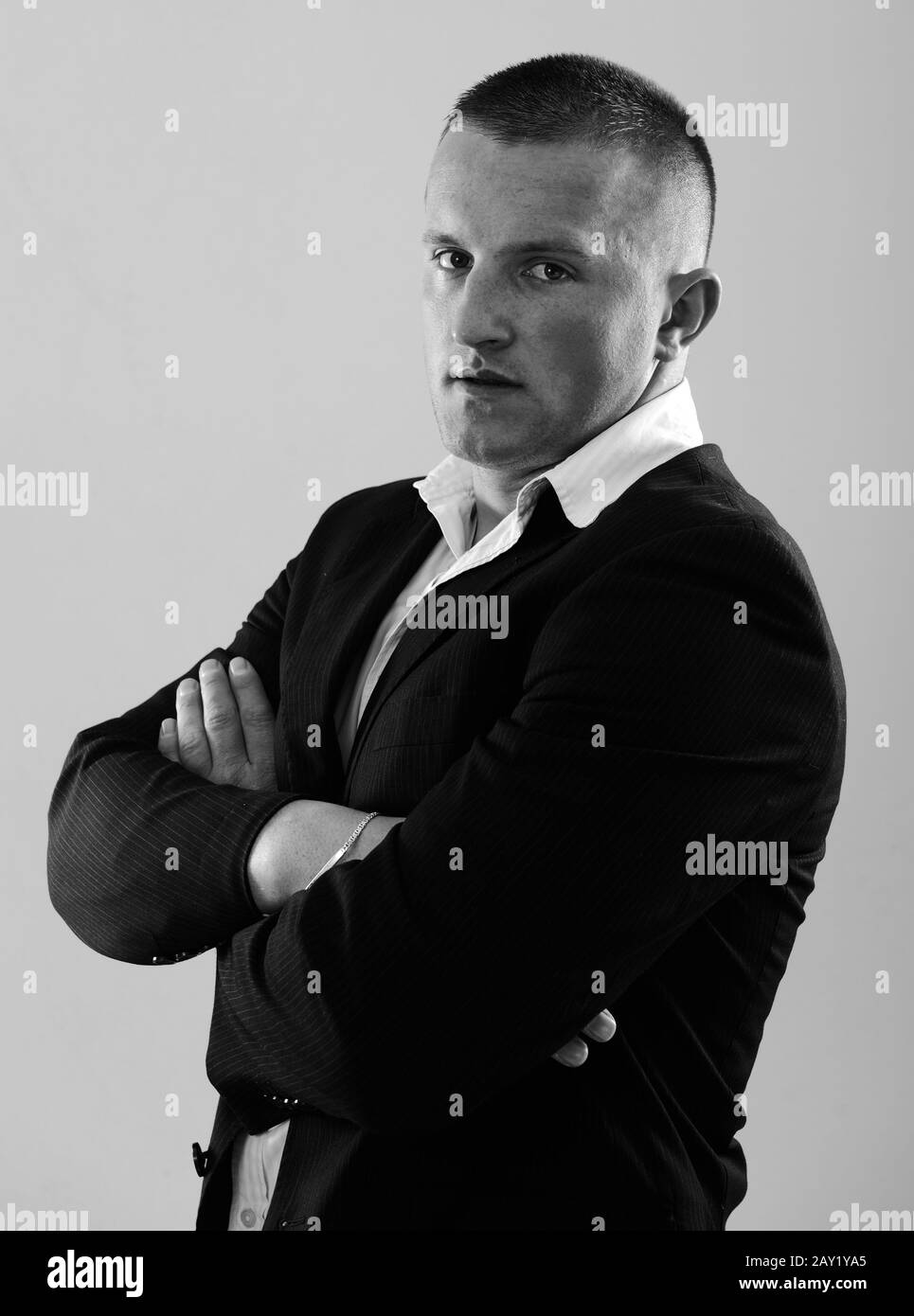 Young business man wearing suit Stock Photo - Alamy
