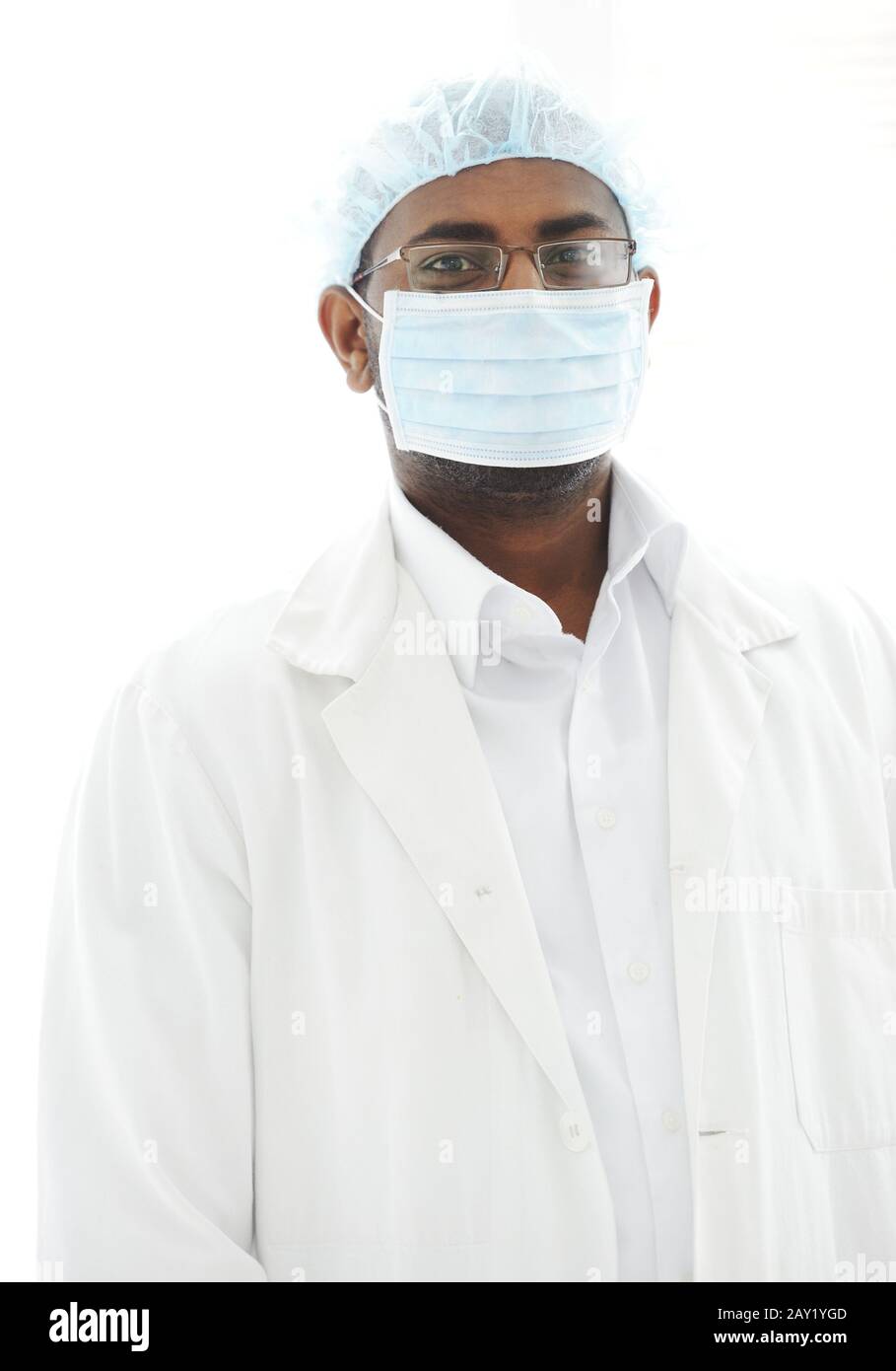 Confident African American male surgeon smiling Stock Photo