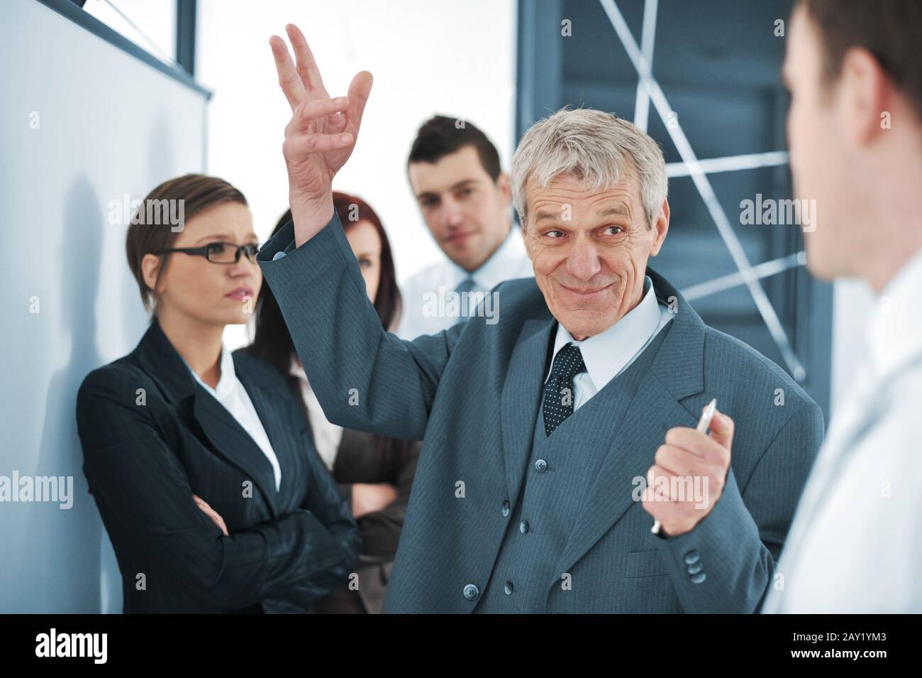 Business team discussing a project with boss Stock Photo