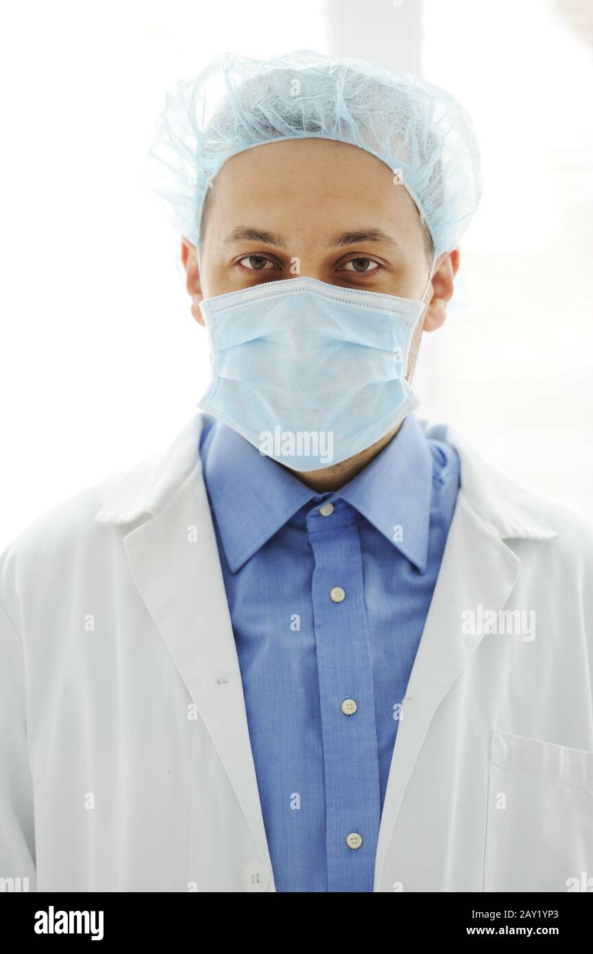 Doctor with a mask at hospital Stock Photo